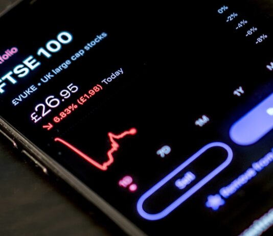 일상에 스며든 AI 건강 관리…’나만의 건강 코치’ 시대 열리다 black smartphone on brown wooden table