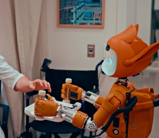 일상에 파고든 AI 건강 관리, 생활 속 똑똑한 활용법 Man gives robot bottles on a tray